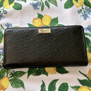 Kate spade continental wallet embossed spade pattern